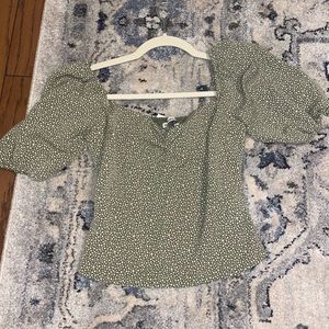 Cute green and white dotted blouse